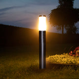 Staande buitenlamp zwart rond 65 cm IP44 - Gomera - vooraanzicht - sfeerfoto - avond