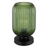 Groene glazen tafellamp met geribbelde structuur en zwarte ronde voet, vooraanzicht tegen witte achtergrond.