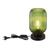 Groene glazen tafellamp met geribbelde structuur, zwarte ronde voet en aan/uit-schakelaar met netsnoer, gefotografeerd in vooraanzicht tegen een witte achtergrond.