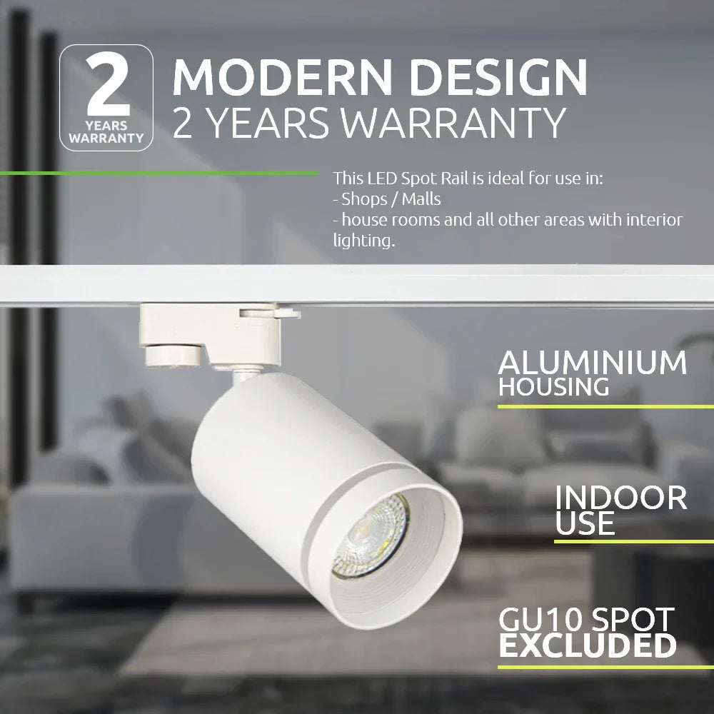 Wit aluminium LED railspot armatuur met modern cilindrisch design, geschikt voor gebruik binnenshuis in winkels, woonkamers en andere interieurtoepassingen; vooraanzicht van het product gemonteerd op een rail, zonder GU10 lamp inbegrepen.
