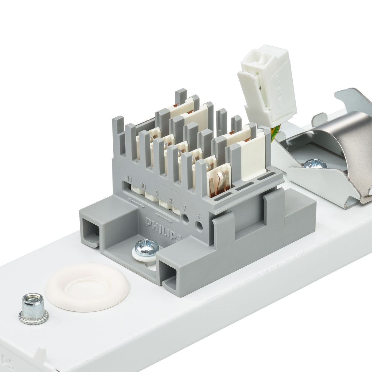 Close-up zijaanzicht van een Philips elektrische connector met genummerde aansluitpunten en gemonteerde bedrading, onderdeel van een verlichtingsarmatuur.