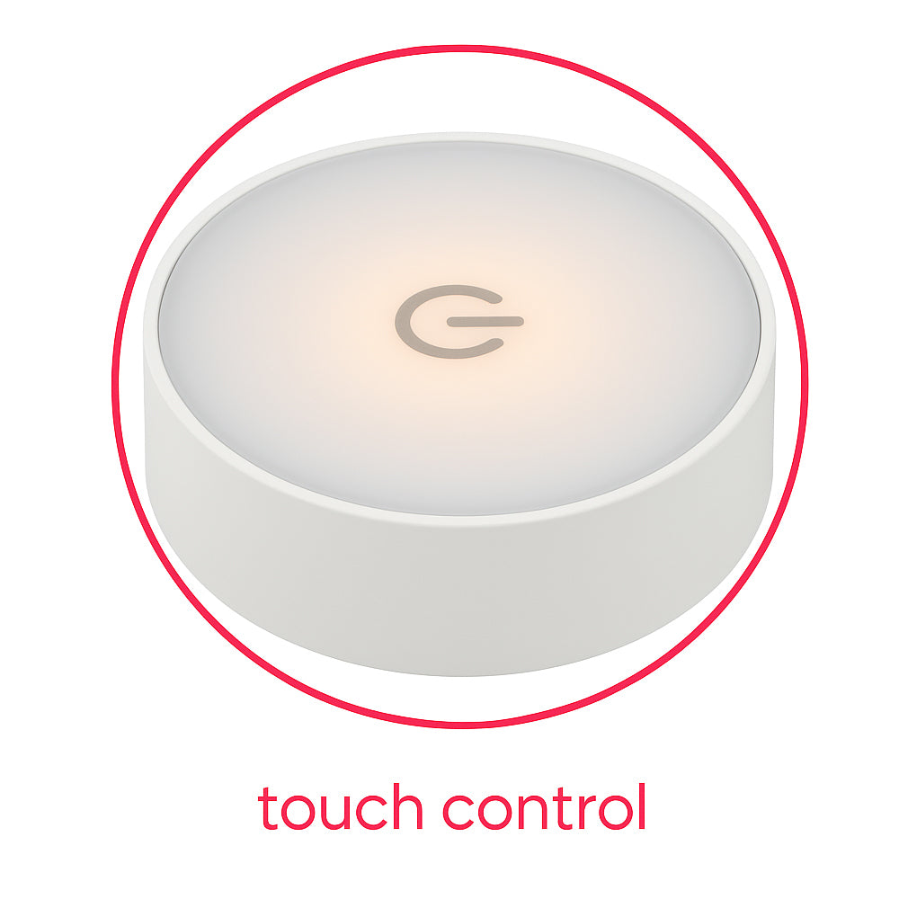 Ronde witte touchbediening met verlicht aan/uit-symbool, bovenaanzicht, gebruikt voor het aansturen van elektronische apparaten.