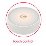 Ronde witte touchbediening met verlicht aan/uit-symbool, bovenaanzicht, gebruikt voor het aansturen van elektronische apparaten.