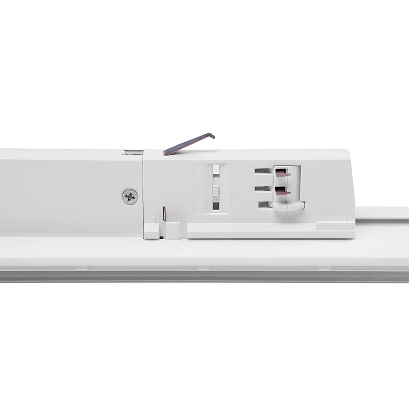 Trackrail spanningsrail connector wit – vooraanzicht van een witte 3-fase spanningsrail connector met zicht op de aansluitpunten en vergrendelingsmechanisme. Ideaal voor het verbinden van railverlichting in professionele lichtinstallaties.