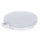 Ronde LED plafondlamp met bewegingssensor, wit, schuine zijaanzicht met zicht op de sensor en bedieningsknoppen aan de zijkant.