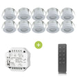 Set van 10 ronde LED inbouwspots in witte behuizing, inclusief RF-dimmermodule en afstandsbediening, vooraanzicht van alle componenten.