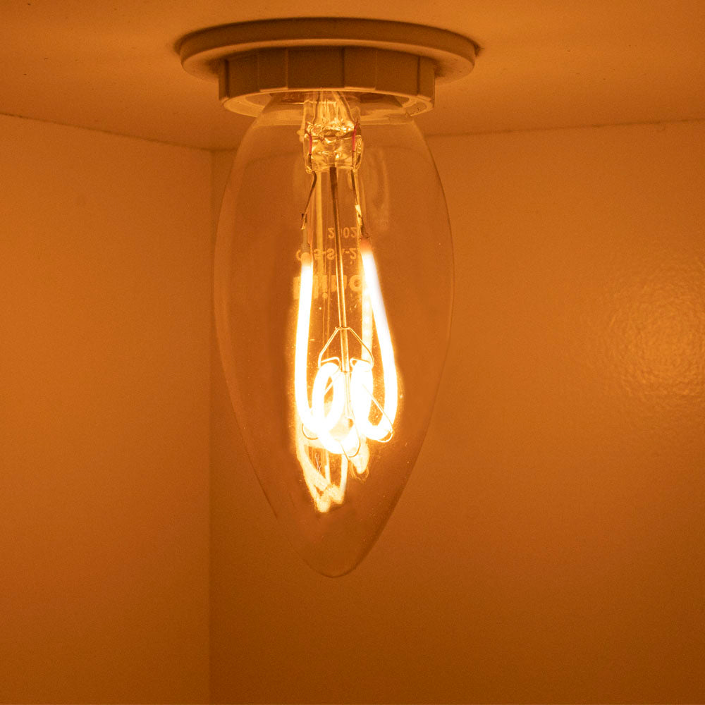 LED Spiraal kaarslamp amber 4W | dimbaar | E14 | 2200K - Extra warm - sfeerfoto