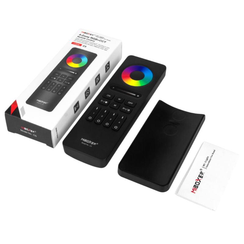Afbeelding van de MiBoxer C5 2.4GHz RGB+CCT afstandsbediening set, inclusief verpakking, afstandsbediening met kleurenwiel, houder en handleiding, gefotografeerd in een bovenaanzicht op een witte achtergrond.