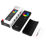 Afbeelding van de MiBoxer C5 2.4GHz RGB+CCT afstandsbediening set, inclusief verpakking, afstandsbediening met kleurenwiel, houder en handleiding, gefotografeerd in een bovenaanzicht op een witte achtergrond.