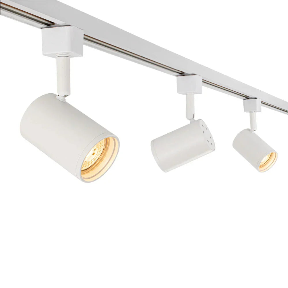 Wit 3-fase rail systeem met drie cilinder spotlampen, LED-verlichting, zijaanzicht, modern en minimalistisch design voor plafondmontage.