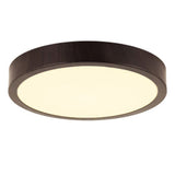 Moderne ronde LED plafondlamp met donkerhouten afwerking, warm wit licht en strak design – zijaanzicht schuin van onderen.