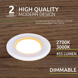 Moderne dimbare inbouwspot LED verlichting, wit rond ontwerp met warm witte kleuropties (2700K en 3000K), 455 lumen, bovenaanzicht op houten ondergrond, geschikt voor gebruik binnenshuis met 2 jaar garantie en een levensduur van 20.000 uur.