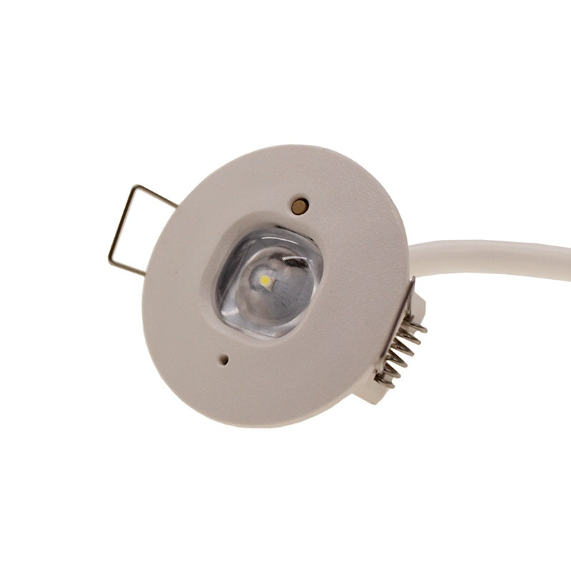 Close-up vooraanzicht van een ronde LED inbouwspot met witte behuizing en heldere lens, voorzien van aansluitkabel en metalen montageclip.