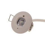 Close-up vooraanzicht van een ronde LED inbouwspot met witte behuizing en heldere lens, voorzien van aansluitkabel en metalen montageclip.