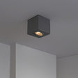 Opbouw spot armatuur zwart Kantelbaar vierkant GU10 fitting - warm wit licht - sfeerfoto