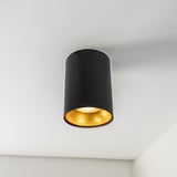 Opbouw spot armatuur zwart met goud 85 x 100mm Rond incl. GU10 fitting - warm wit licht - sfeerfoto