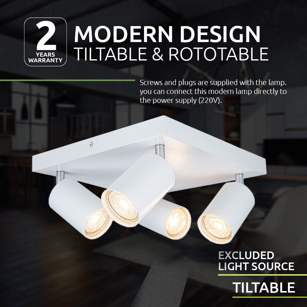 Wit moderne plafondlamp met vier kantelbare en roteerbare spotlights, afgebeeld in een schuine onderaanzicht tegen een sfeervolle interieurachtergrond; ontwerp met strakke lijnen en geschikt voor 220V aansluiting, lichtbronnen niet inbegrepen.