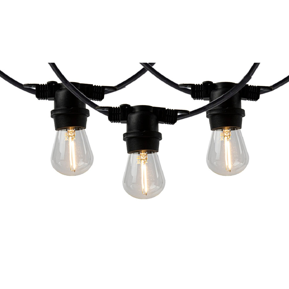 Close-up vooraanzicht van een zwarte prikkabel met drie heldere LED filament lampen, geschikt voor sfeervolle buitenverlichting.