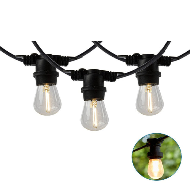 Close-up vooraanzicht van een zwarte LED prikkabel met heldere filamentlampen, geschikt voor buitengebruik en sfeervolle tuinverlichting, met een kleine inset-afbeelding van een brandende lamp in buitensituatie.