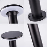 Close-up afbeeldingen van een moderne zwarte LED buitenlamp met ronde montageplaat en cilindrische staander, getoond vanuit verschillende hoeken: onderaanzicht van de lampkop, bovenaanzicht van de montagevoet, zijaanzicht van de lampkop en schuin zijaanzicht van de staander.