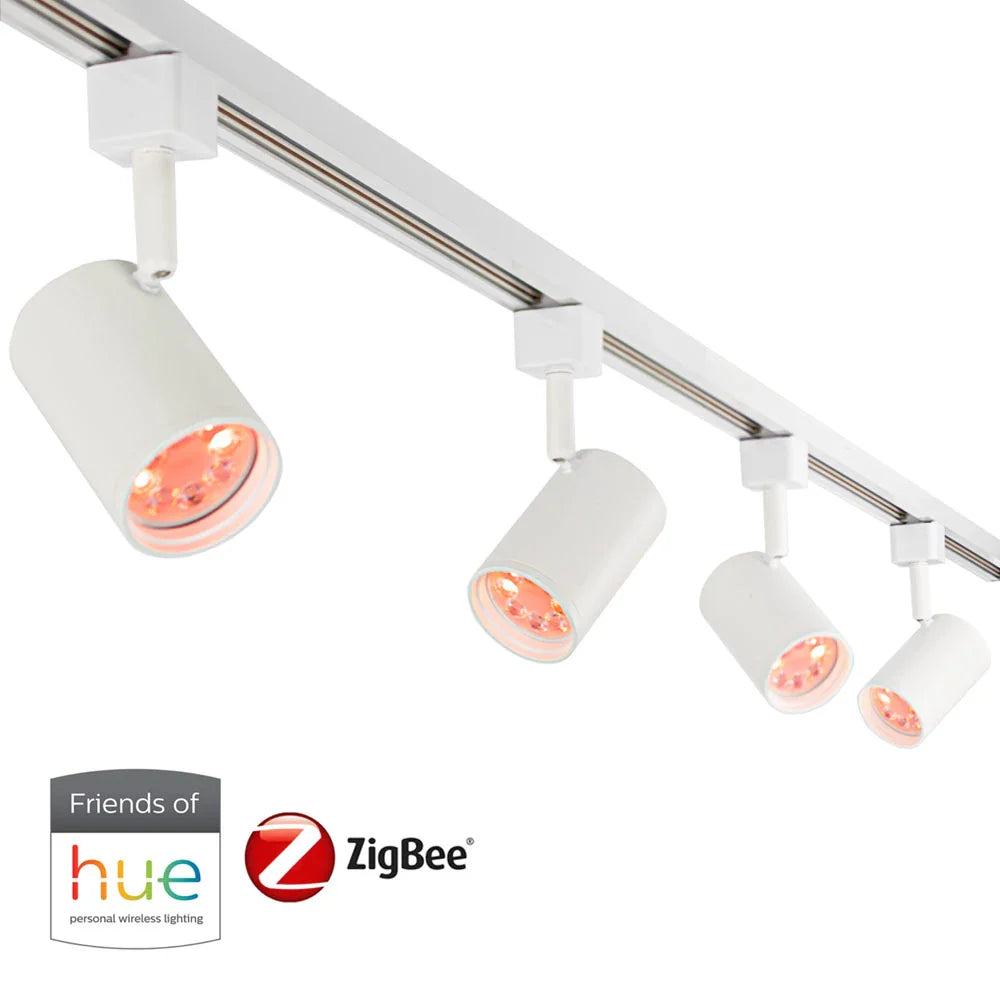 Wit ZigBee railverlichtingssysteem met vier verstelbare LED spots, compatibel met Philips Hue, schuin van onderen gefotografeerd tegen een witte achtergrond.