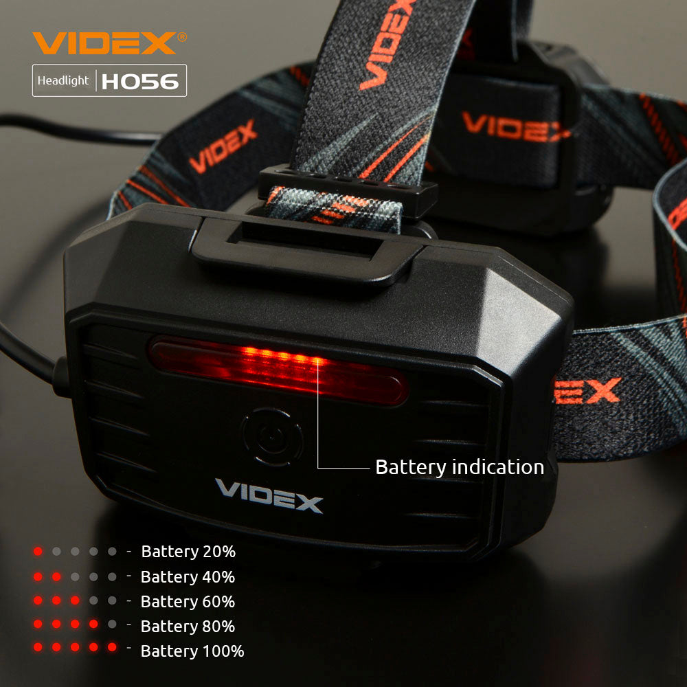 Close-up achteraanzicht van de VIDEX HO56 hoofdlamp met zichtbare batterij-indicator en verstelbare hoofdband met merklogo.